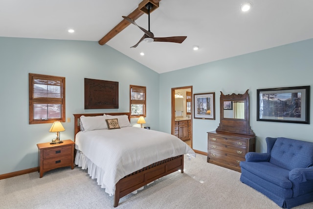 carpeted bedroom featuring ceiling fan, ensuite bathroom, multiple windows, and vaulted ceiling with beams