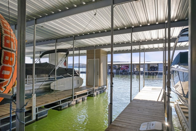 view of dock with a water view