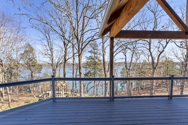 wooden deck with a water view