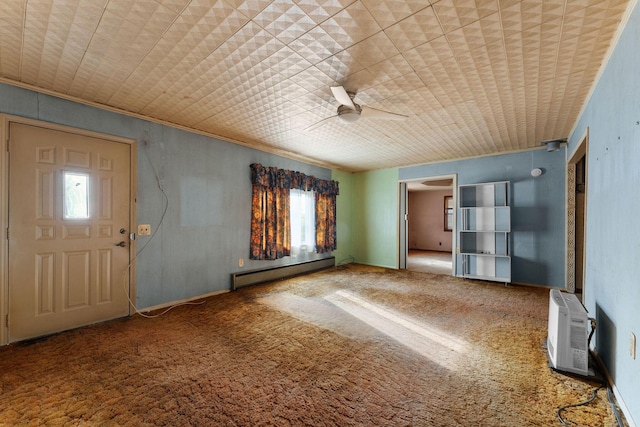 unfurnished living room featuring carpet floors, a baseboard radiator, and ceiling fan