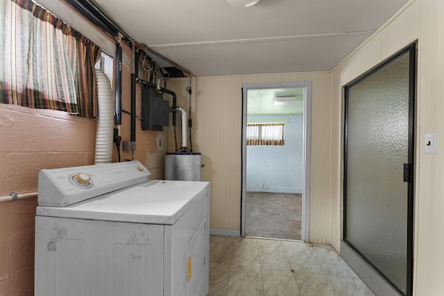 washroom with washer / clothes dryer and water heater