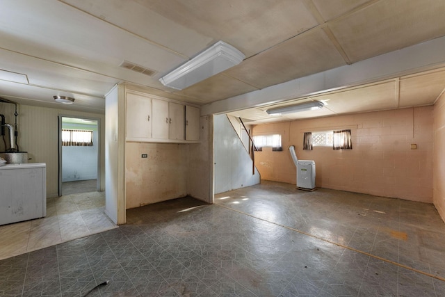 bonus room featuring washer / clothes dryer