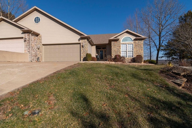 single story home with a garage and a front yard