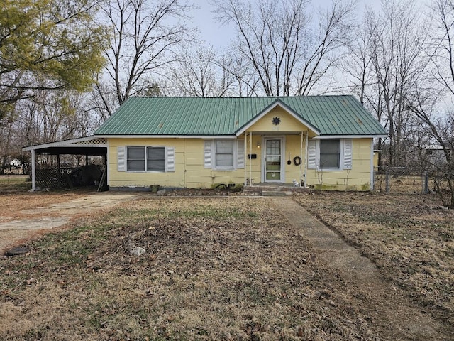 view of front of home featuring a carport