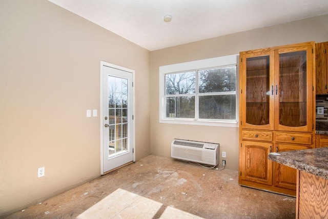 entryway with a wall mounted air conditioner