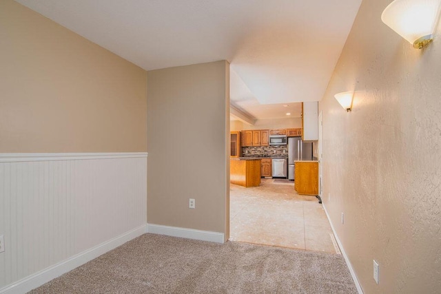 interior space featuring light colored carpet