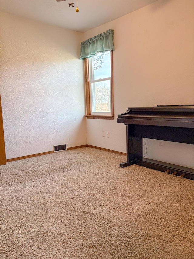 interior space featuring carpet