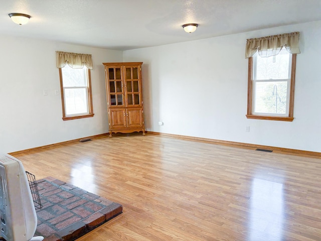 empty room featuring light hardwood / wood-style floors