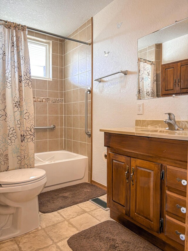 full bathroom featuring vanity, toilet, a textured ceiling, and shower / bathtub combination with curtain