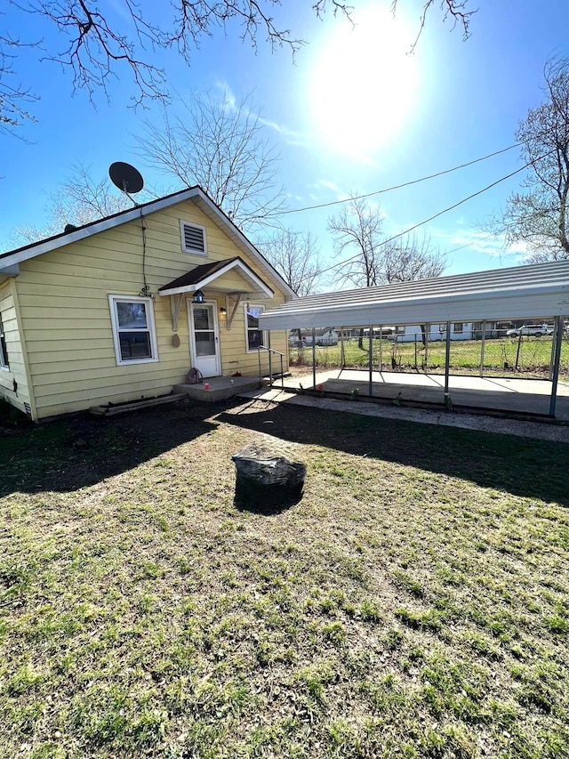 view of yard with a carport