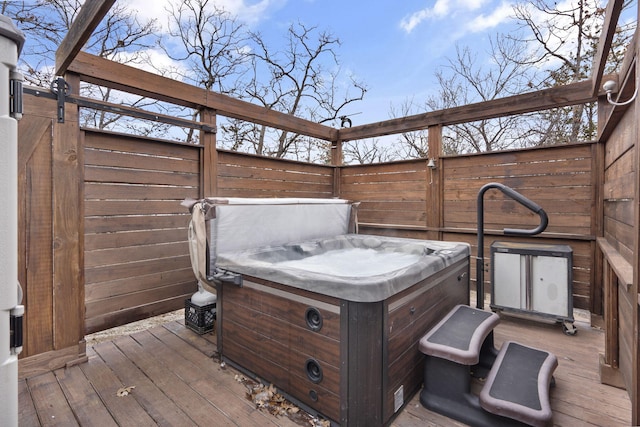 deck with a hot tub