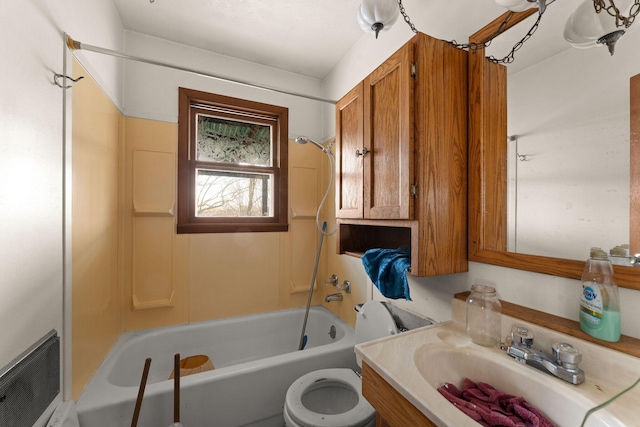 full bathroom with vanity, toilet, and shower / bath combo with shower curtain