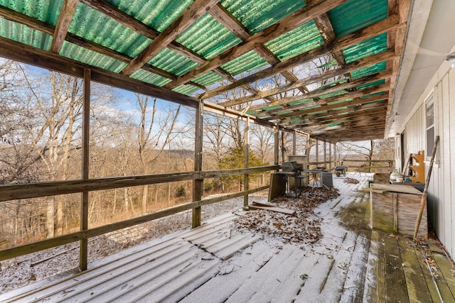 view of snow covered deck