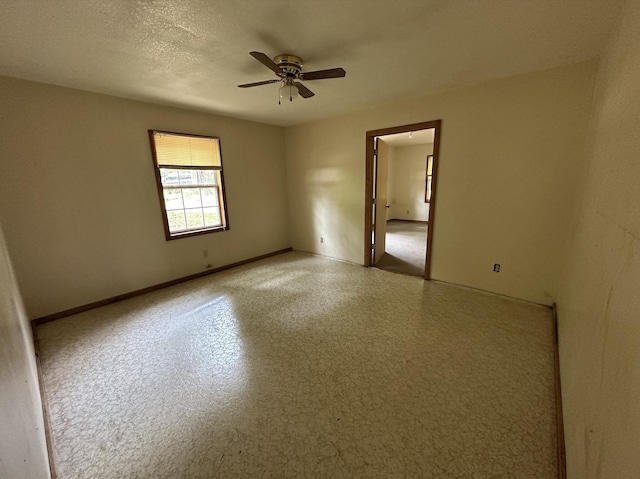 406 Red Bridge Rd, Ozark, MO 65721 - empty room featuring a ceiling fan and baseboards