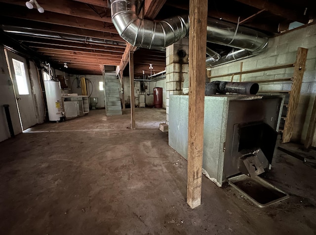 406 Red Bridge Rd, Ozark, MO 65721 - below grade area featuring water heater and washer / dryer