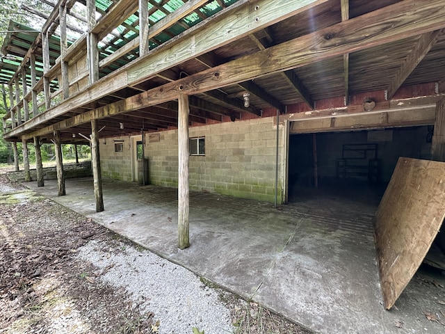 406 Red Bridge Rd, Ozark, MO 65721 - view of patio featuring a garage
