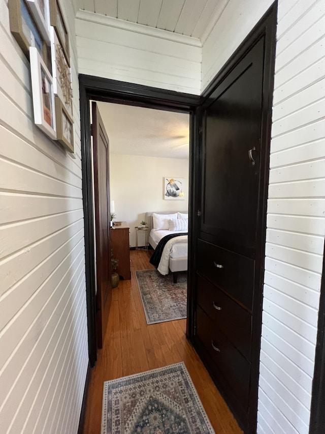 hallway featuring dark wood-style floors