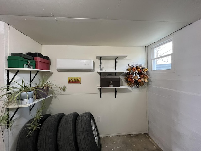 interior space featuring an AC wall unit