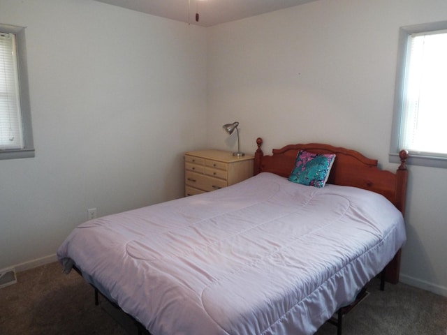 bedroom featuring carpet