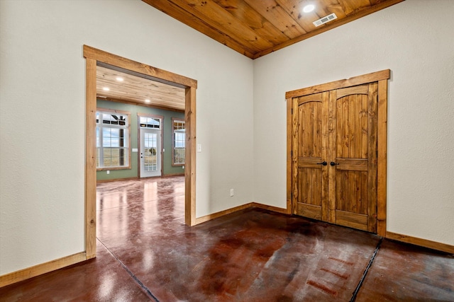 foyer entrance with wooden ceiling