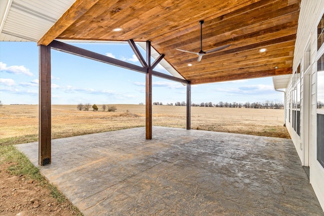 view of patio / terrace with a rural view and ceiling fan