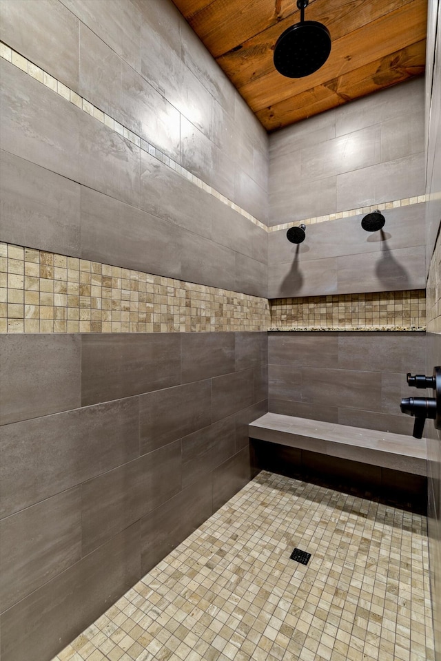 bathroom with wood ceiling and walk in shower