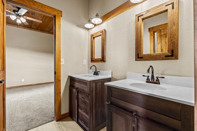 bathroom featuring vanity, vaulted ceiling, ceiling fan, and wood ceiling