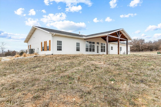 back of property with cooling unit