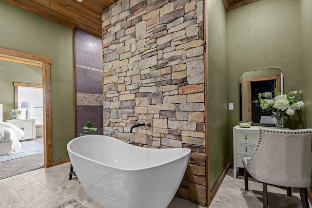 10263 State Highway 14 W, Billings, MO 65610 - bathroom with wooden ceiling, a freestanding tub, and baseboards