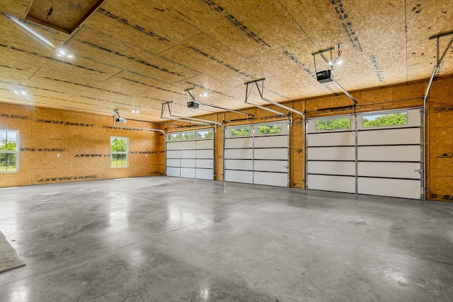 10263 State Highway 14 W, Billings, MO 65610 - garage featuring a garage door opener