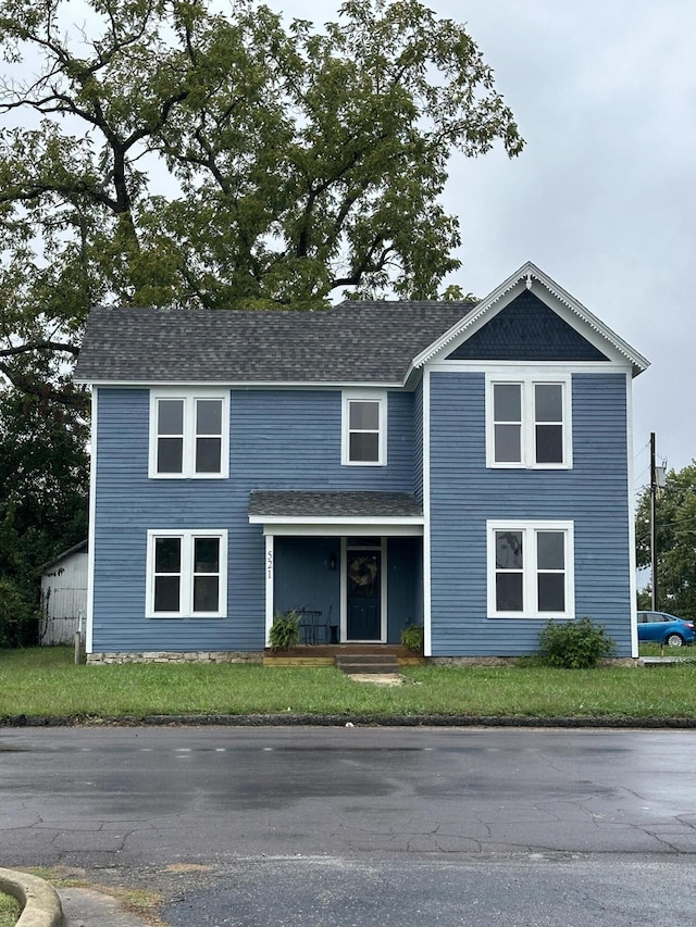 front of property with a front yard