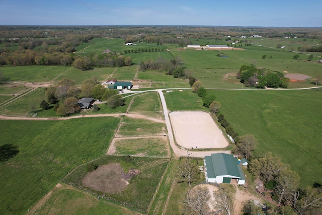 birds eye view of property featuring a rural view