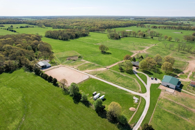 birds eye view of property with a rural view