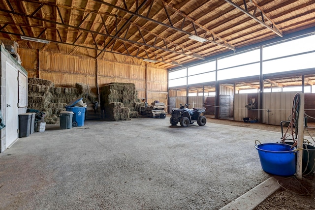 interior space with plenty of natural light and high vaulted ceiling