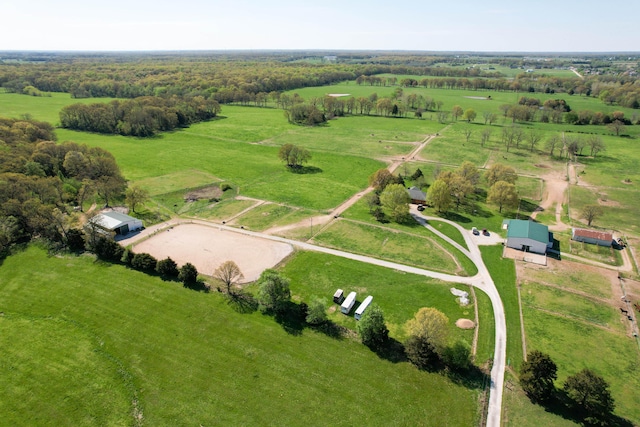 birds eye view of property with a rural view