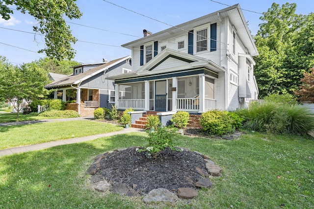 view of front of house featuring a porch and a front yard