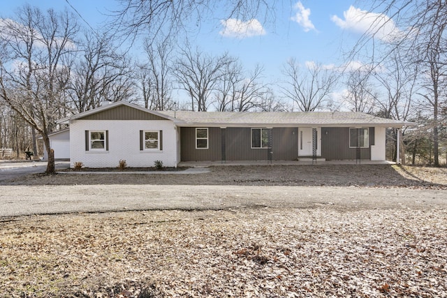 ranch-style house featuring a garage