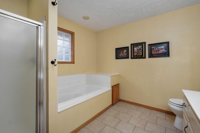 full bathroom featuring toilet, separate shower and tub, a textured ceiling, vanity, and tile patterned flooring