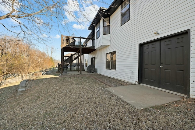 exterior space with a deck and a patio area