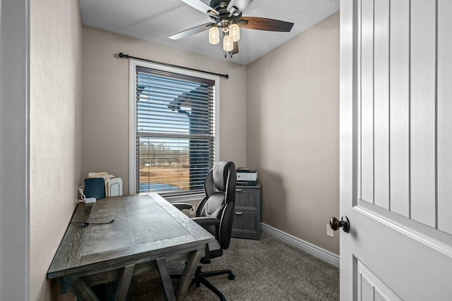 office with carpet floors and ceiling fan