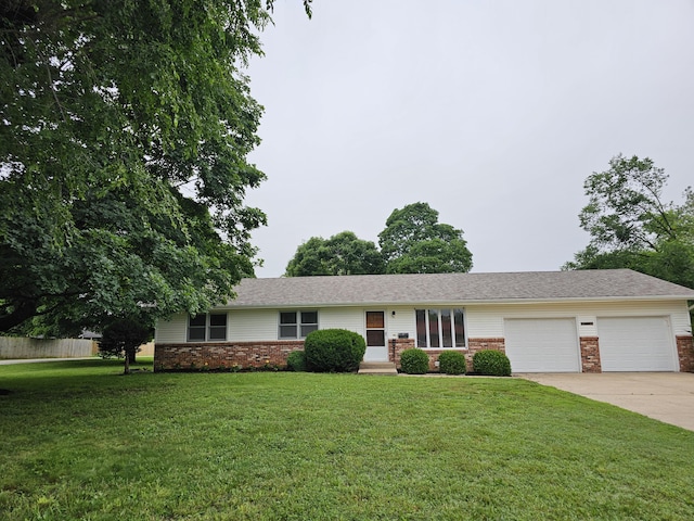 1313 S Madison Ave, Aurora, MO 65605 - ranch-style house with an attached garage, driveway, and brick siding