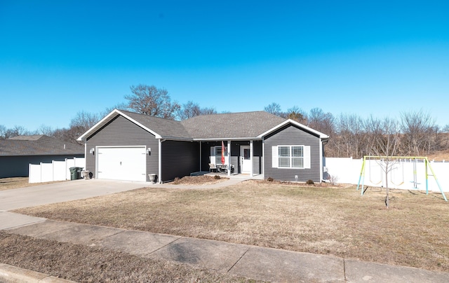 ranch-style home with a garage, a porch, and a front yard