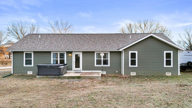 1989 Crawford St, West Plains, MO 65775 - back of house with a yard, a patio area, and a hot tub