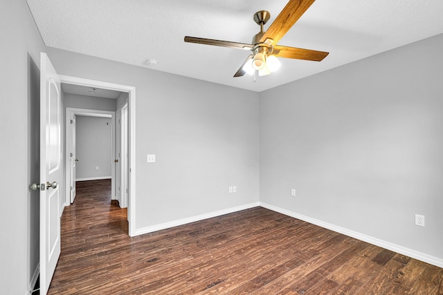 1989 Crawford St, West Plains, MO 65775 - unfurnished room featuring a textured ceiling, dark wood-type flooring, and ceiling fan