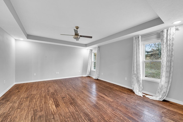 1989 Crawford St, West Plains, MO 65775 - empty room with dark hardwood / wood-style floors and ceiling fan