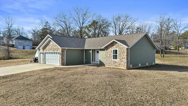 single story home with a garage and a front lawn