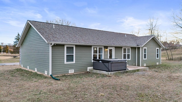 1989 Crawford St, West Plains, MO 65775 - back of house featuring a hot tub