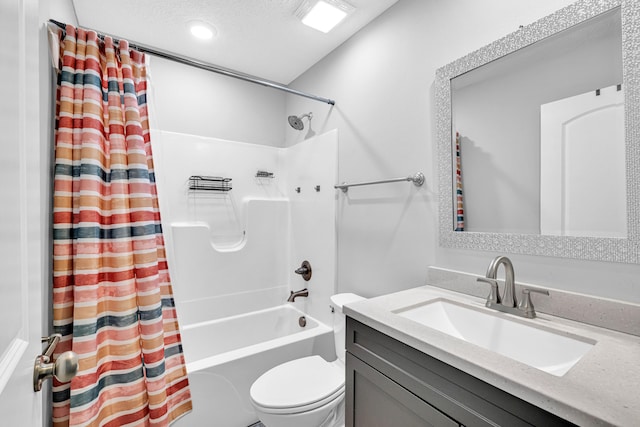 1989 Crawford St, West Plains, MO 65775 - full bathroom featuring vanity, shower / bath combination with curtain, a textured ceiling, and toilet