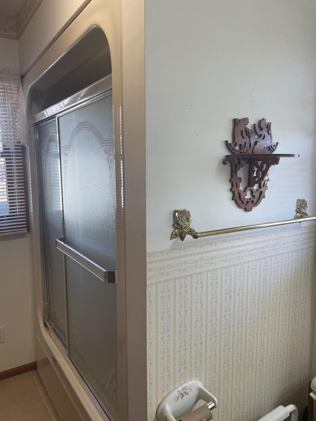 bathroom featuring an enclosed shower