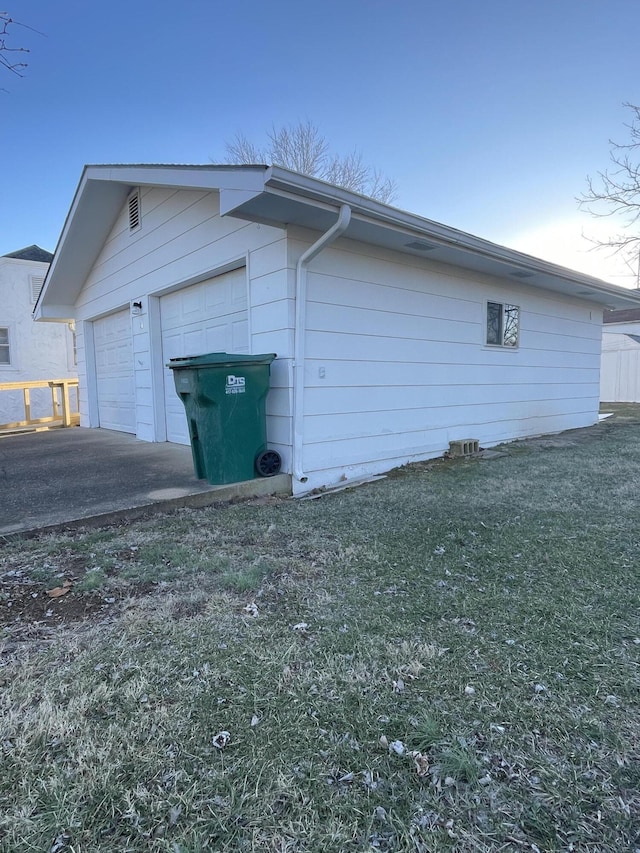 view of property exterior with a lawn